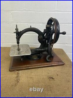Antique Willcox and Gibbs Hand Cranked American Sewing Machine on Wooden Base