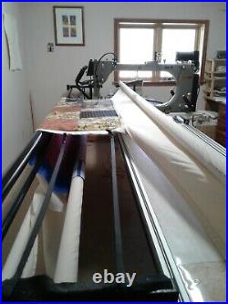 Gammill longgarm quilting machine on 14 foot table and entire quilting studio
