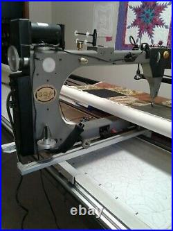 Gammill longgarm quilting machine on 14 foot table and entire quilting studio