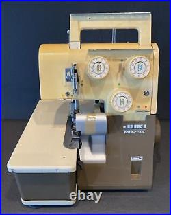 JUKI MO-134 Overlock Sewing Machine w Pedal Cover Accessories Powers On. Read