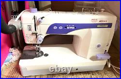 Janome 1600P Sewing Machine with Manual, Pedals, Cover & Free Motion Foot