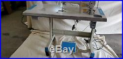 Juki DDL-8700 SEWING MACHINE WITH T-LEGS STAND, CASTERS, SERVO MOTOR LED LAMP