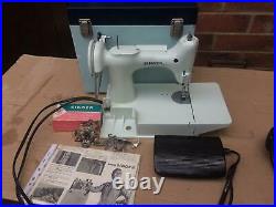 White Singer 221K Featherweight vintage Sewing Machine with attachments