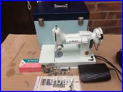 White Singer 221K Featherweight vintage Sewing Machine with attachments